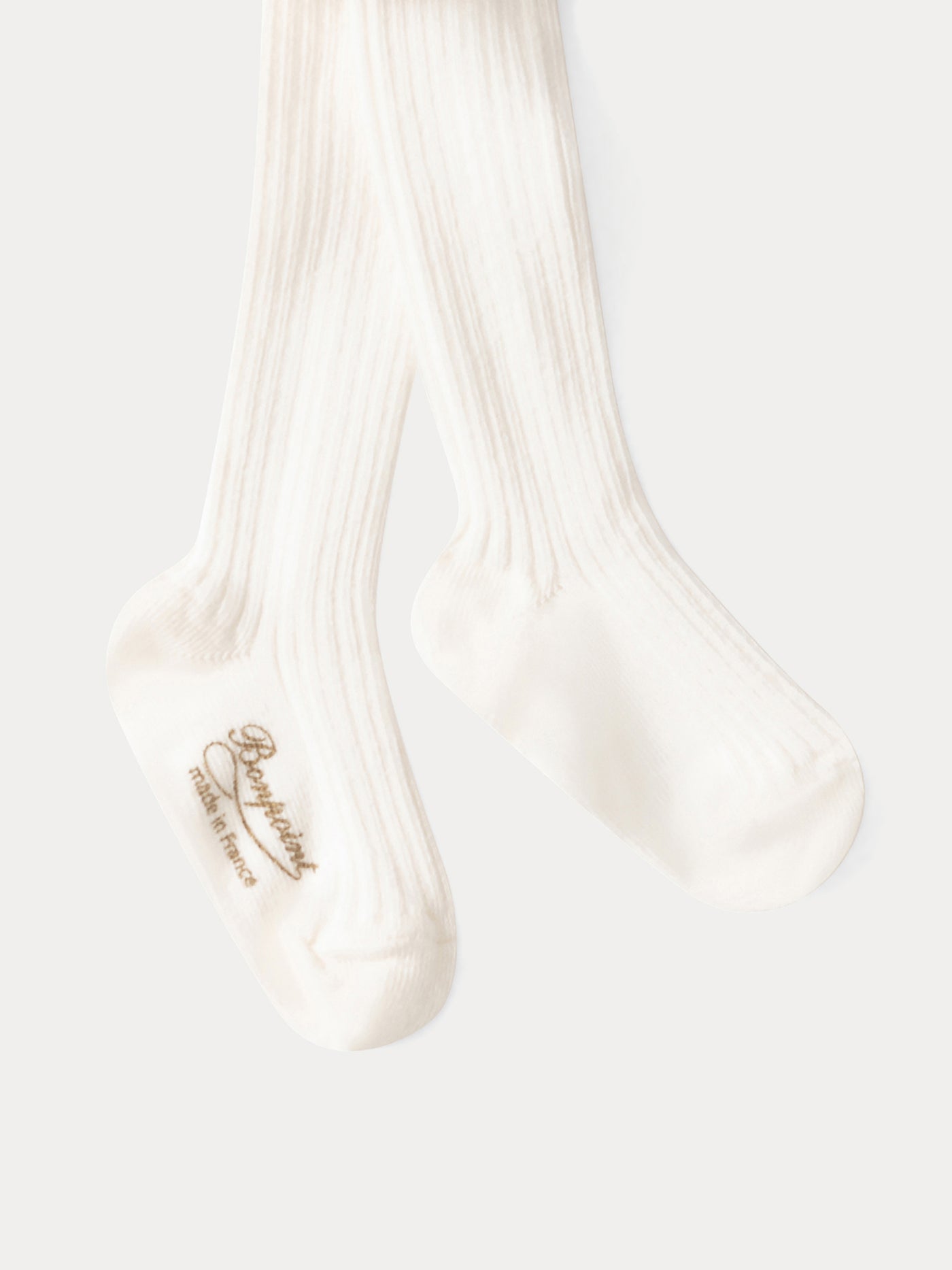 Collants à côtes bébé en coton blanc lait